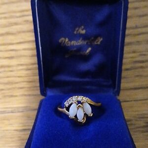 Elegant Gold and White Stone Ring